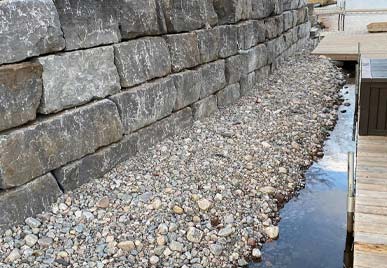 retaining walls installing design excavation landscaping